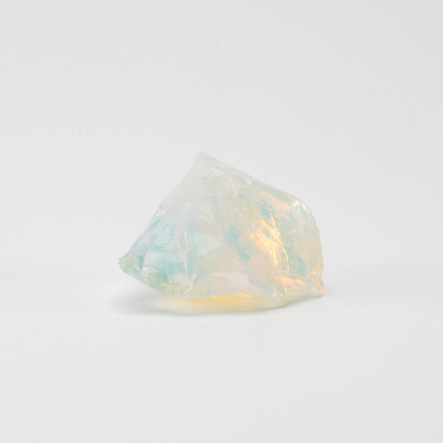 Iridescent Opal incense holder with shifting pastel hues