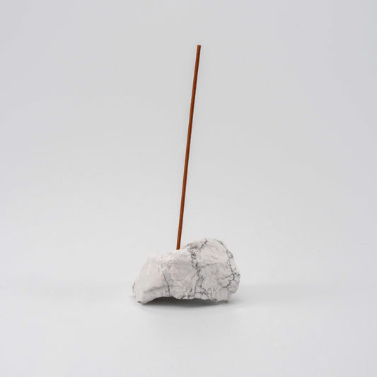 Soft white Howlite incense holder with a single upright incense stick