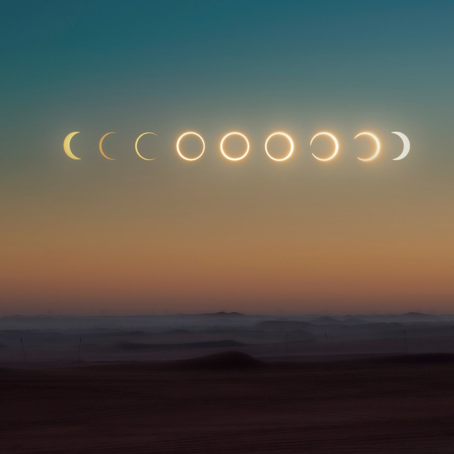 Solar eclipse phases across a desert twilight sky