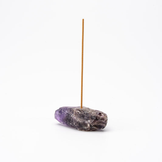 purple Amethyst gemstone incense holder with a single upright incense stick