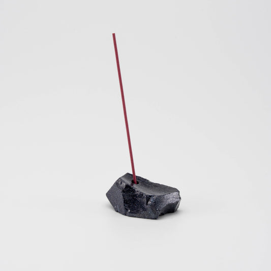 Sparkling navy Blue Goldstone incense holder with a single upright incense stick