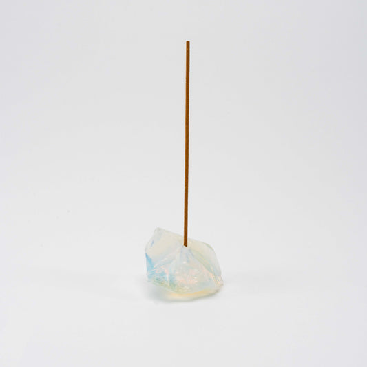 Iridescent Opal incense holder with a single upright incense stick