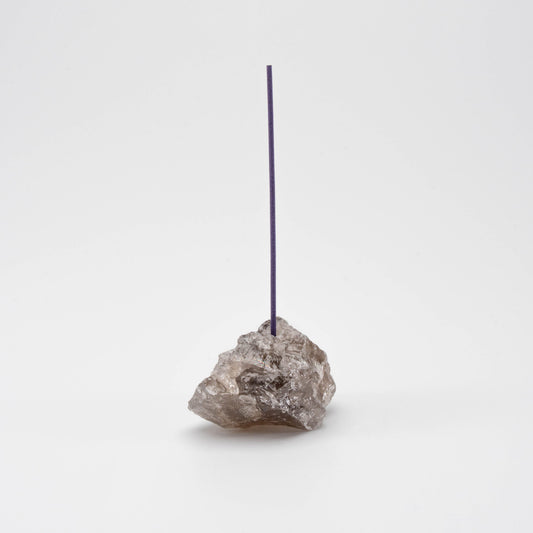 Brown Smoky Quartz incense holder with a single upright incense stick